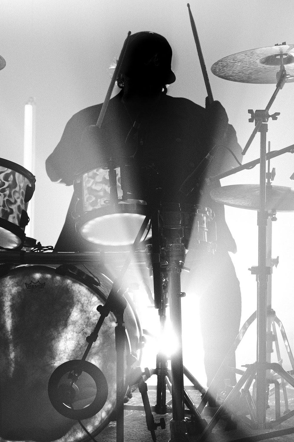drummer with light behind